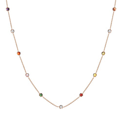 This 14 karat gold necklace features colourful stones bezel set in gold. 