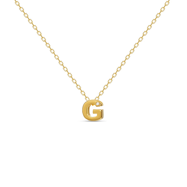 A 18 karat gold vermeil necklace with your initial letter "G". This diamond letter necklace is a special jewelry necklace that can be worn day and night. A genuine diamond stone in the corner of the letter makes this gold diamond necklace a luxury and ideal gift for yourself, your best friend or loved one. 
